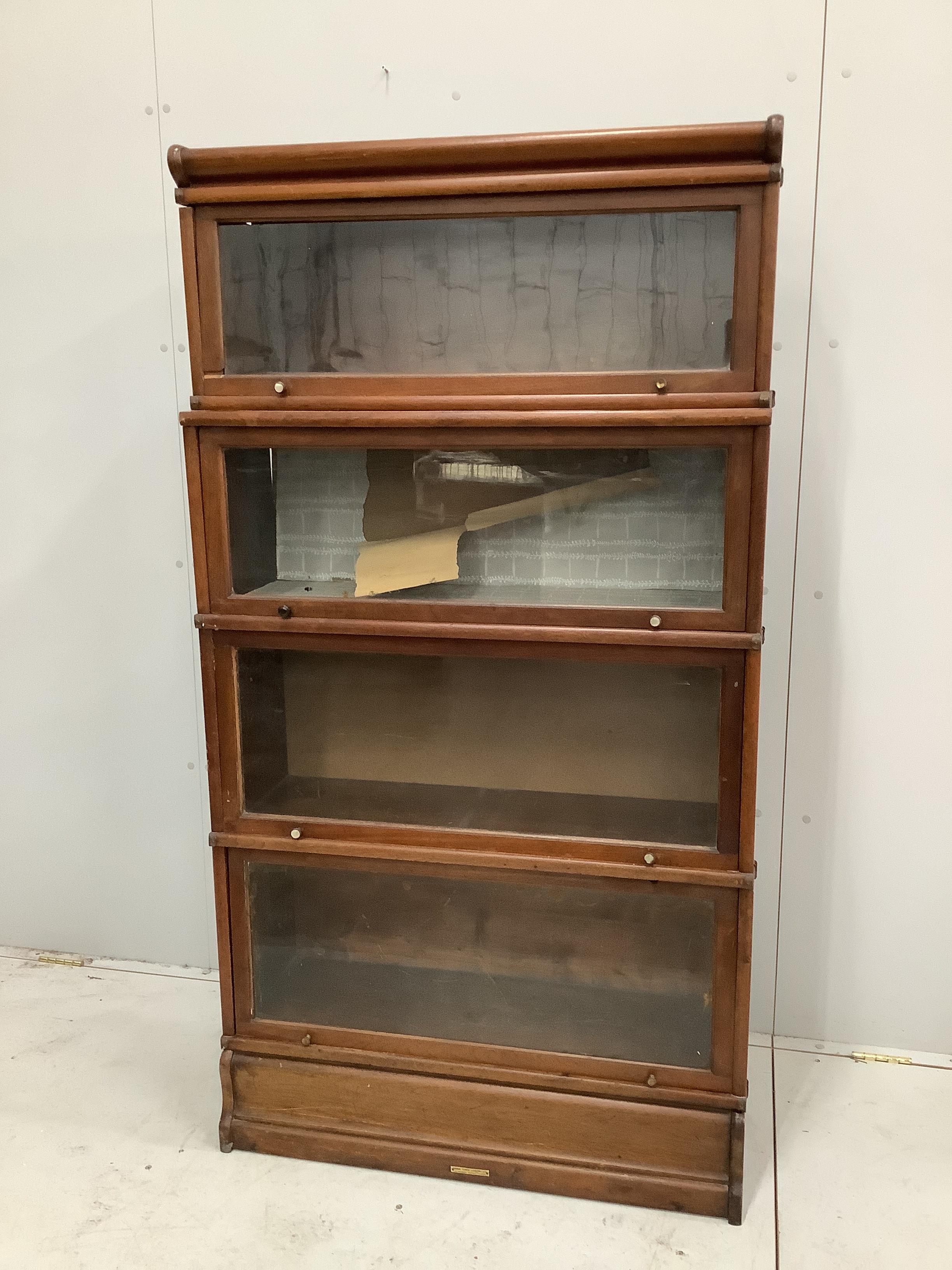 A walnut Globe Wernicke style four section bookcase, width 86cm, depth 29cm, height 160cm